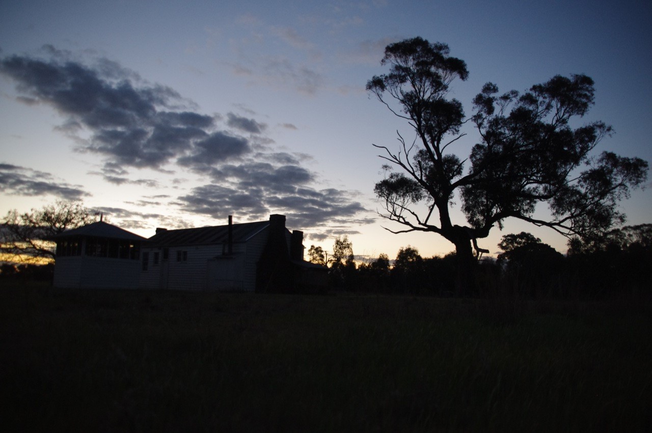 thumbnail_Hut and outhouses sunset Sept_